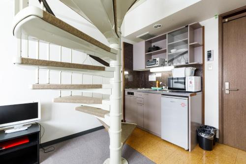 Shared lounge/TV area, Condominium Hakuba Goryu in Hakuba