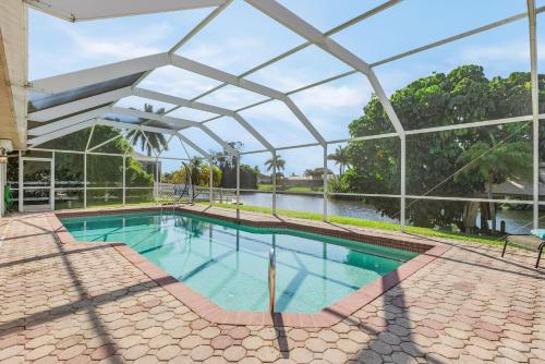 Luxury Waterfront Home with Pool Pet-friendly Villa Tortuga Roelens Vacations