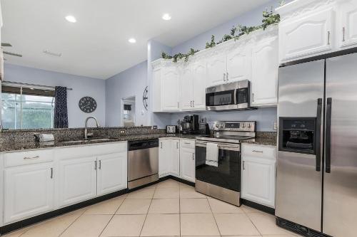 Waterfront Paradise with Heated Pool, Kayaks, & Game Room Villa Cape Paradise Roelens Vacations