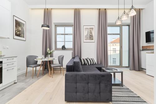 Eleganckie Studia Wyspa Słodowa by Noclegi Renters - image 3