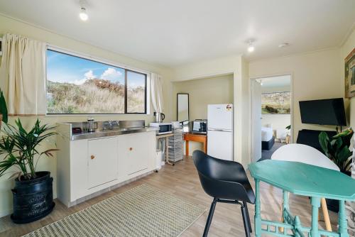 Bruser, Glendhu Station Cottage - Glendhu Bay Holiday Home in Glendhu Bay