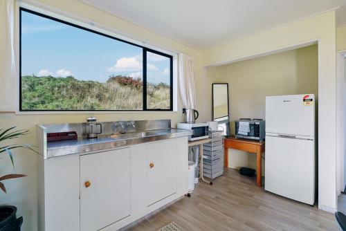 Bruser, Glendhu Station Cottage - Glendhu Bay Holiday Home in Glendhu Bay