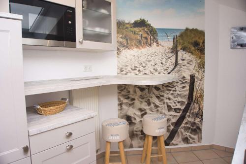 Balkon mit traumhaften Meerblick gratis Nutzung vom AHOI Erlebnisbad und Sauna in Sellin Dünenhaus FeWo05 - image 3