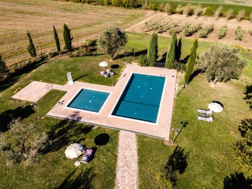 Appartamento in casale con piscina Casa I Pavoni