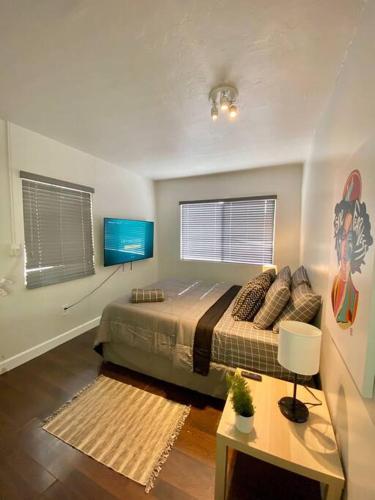 Spacious 3BR House with Studio and garage. The place
