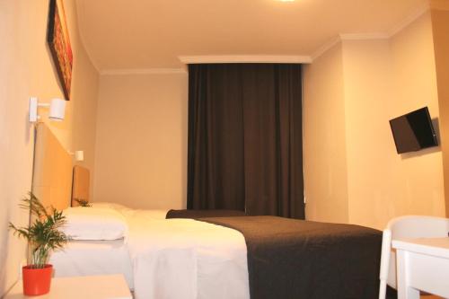Hotel 900 Toscana – Florence, IA