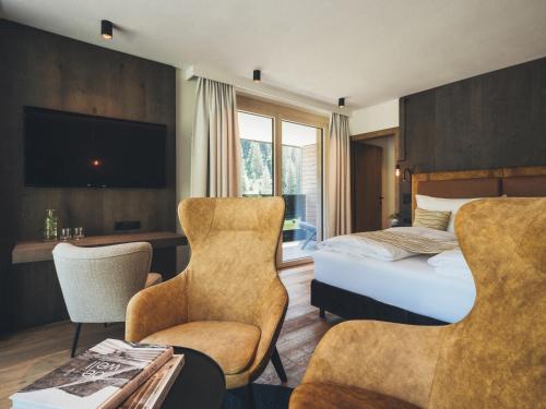 Hotel Tirolerhof Room Type - Family Room with Mountain View Hotel Tirolerhof Room Type - Family Room with Mountain View