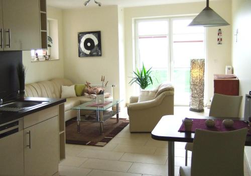 Ferienwohnung mit 1 Schlafzimmer und Schlafsofa für bis zu 3 Personen - Landseite image 4