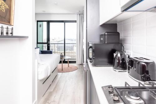 1-on-Albert Studio Apartments - Tap to explore photos