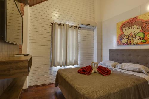 Three-Bedroom Apartment room in Pousada Recanto do Aconchego