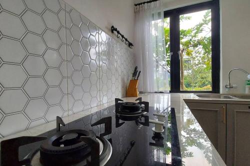 Villa Swandara Rancamaya With Netflix, & Backyard in Rancamaya