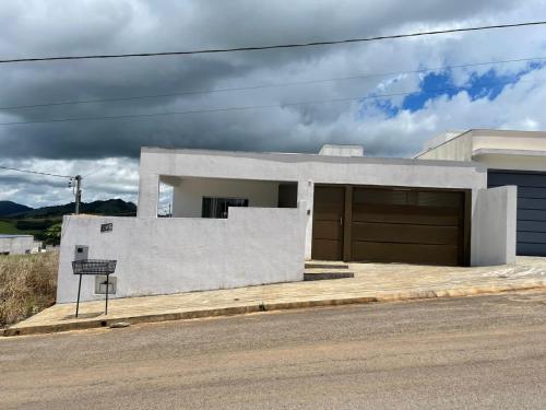 Casa Oliveira, Capitólio