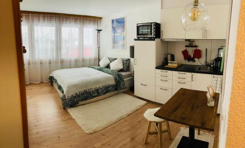 Your Pied-à-terre in Davos - Tap to explore photos