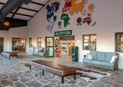 zonă comună salon/TV, At Kronenhof Lodge in Maltahohe