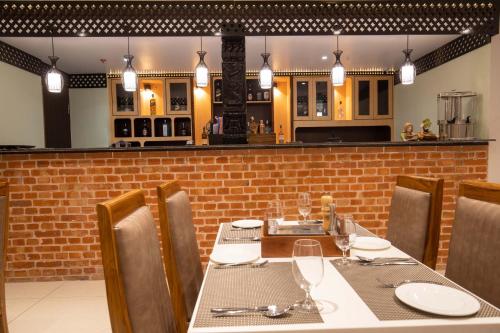 레스토랑, Hotel Palm International in 부트왈