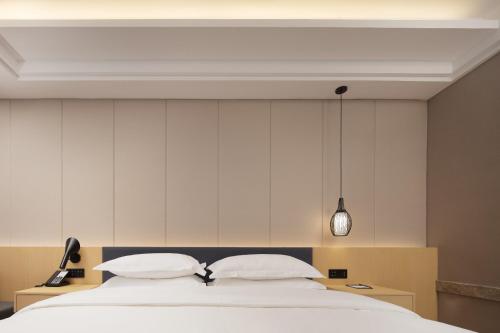 蔚徕酒店长沙贺龙体育馆黄土岭地铁站店 – Changsha, KY