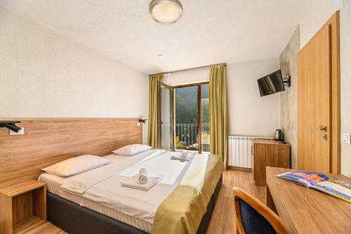 Double or Twin Room with Balcony, Spa and Pool Access