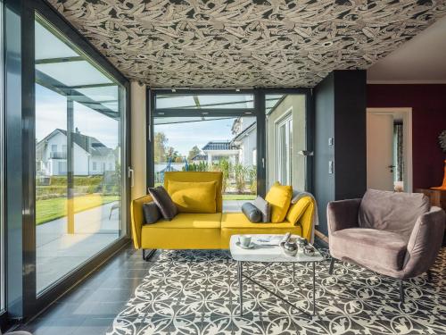 Luxus FeWo 122 m² direkt am Wasser mit Boot in Krakow am See