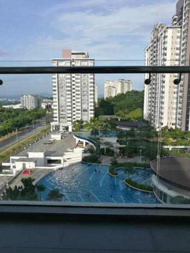 a view of a city skyline from a balcony, Teduhan Kasih Homestay in Kuala Lumpur