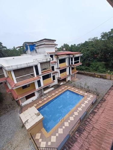 Lovely 2 BHK with swimming pool, power back up and all modern amenities.