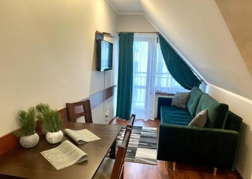 Apart-Center Motyl - image 3