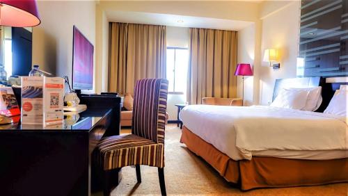 Swiss-Belhotel Silae Palu Room Type - Deluxe Double Room