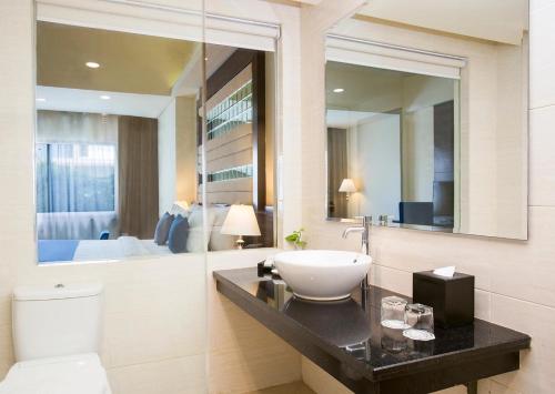 Swiss-Belhotel Silae Palu Room Type - Deluxe Twin Room