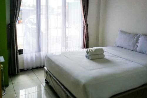 . Sky Flores Bungalow Syariah RedPartner