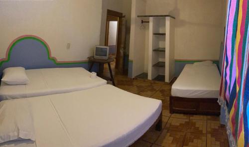 Pargos Hotel & Cowork Room Type - Budget Triple Room with Fan
