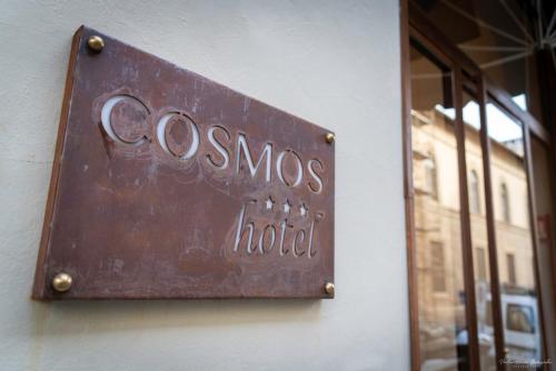 Hotel Cosmos - Tap to explore photos