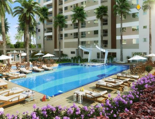 Apartamento novo frente mar com piscina em Home Club