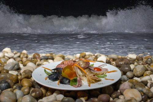 Ferienwohnung ulivo mit Pool und Privatstrand