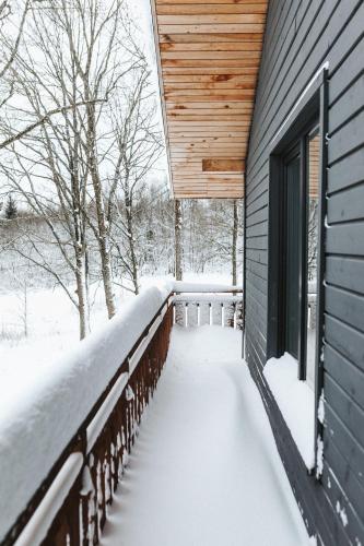 Sniegi Apartments with sauna in Sarkaņi
