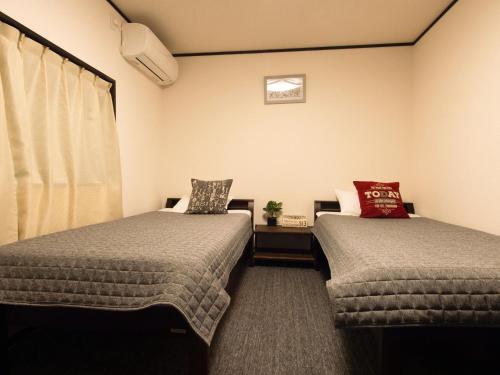 Standard Twin Room with Shared Bathroom