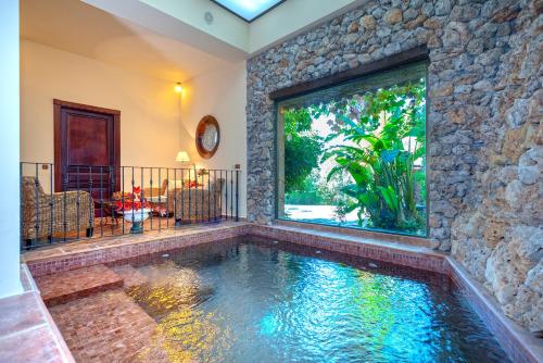 . Casa Flores con Piscina interior climatizada