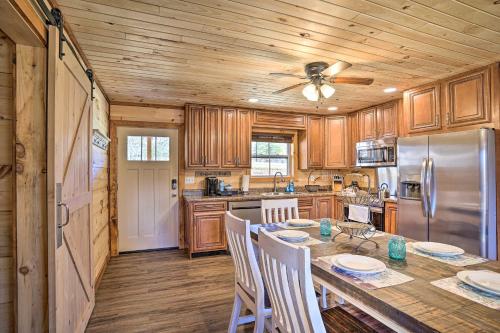 Serene Lakefront Cabin with Deck and Fire Pit!