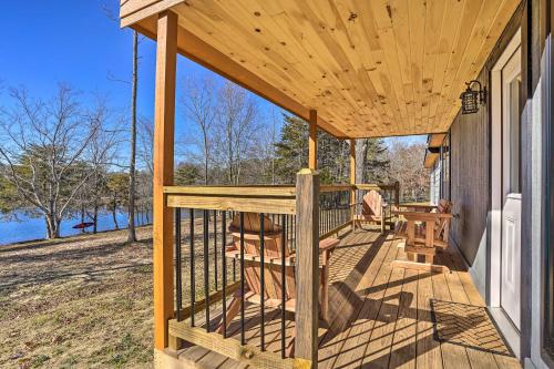 Serene Lakefront Cabin with Deck and Fire Pit!