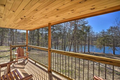Serene Lakefront Cabin with Deck and Fire Pit!