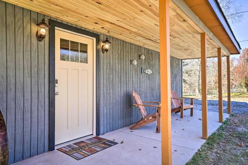 Serene Lakefront Cabin with Deck and Fire Pit!