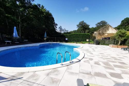 Swimming pool, Moulin des Forges Gites, Camping et Glamping in Bonnat