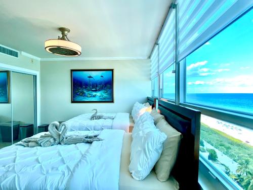 Large luxurious direct ocean front Penthouse or Deluxe one bedroom ocean front condo-free parking-