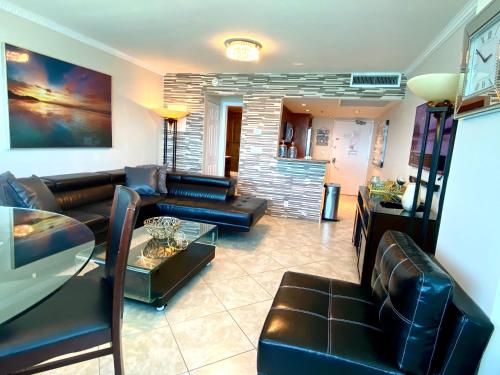 Large luxurious direct ocean front Penthouse or Deluxe one bedroom ocean front condo-free parking-