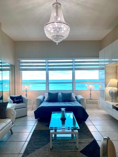 Large luxurious direct ocean front Penthouse or Deluxe one bedroom ocean front condo-free parking-