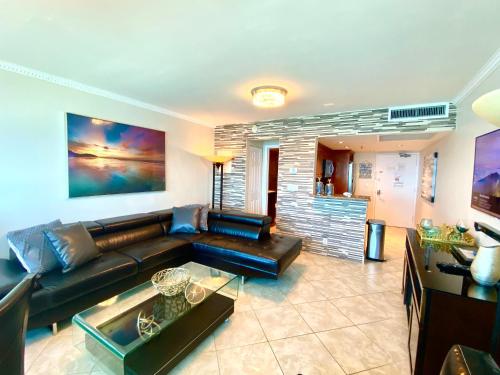 Large luxurious direct ocean front Penthouse or Deluxe one bedroom ocean front condo-free parking-