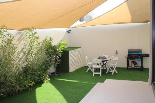 Garden, Smart Living Villa in Damac Hills 2