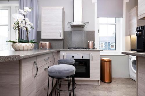 ห้องครัว, Stylish George Street Apartment in ปีเบิล