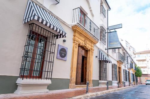 Hotel Maestranza - Tap to explore photos
