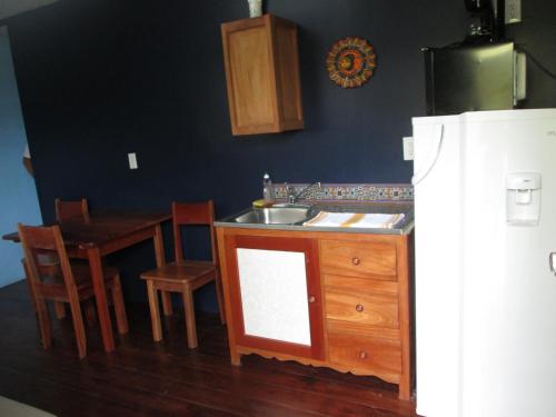 Кухня, Axios Sun Apartments Caye Caulker in Кей Колкер