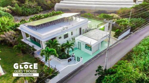 PORT SIDE HOUSE l 砂山ビーチ近くのオーシャンビューバルコニーハウスを貸切 長期滞在向け BBQ可, Miyakojima