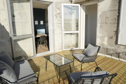 T2 de 55m2 avec toit terrasse, hyper centre, wifi, draps, savons et serviettes fournis